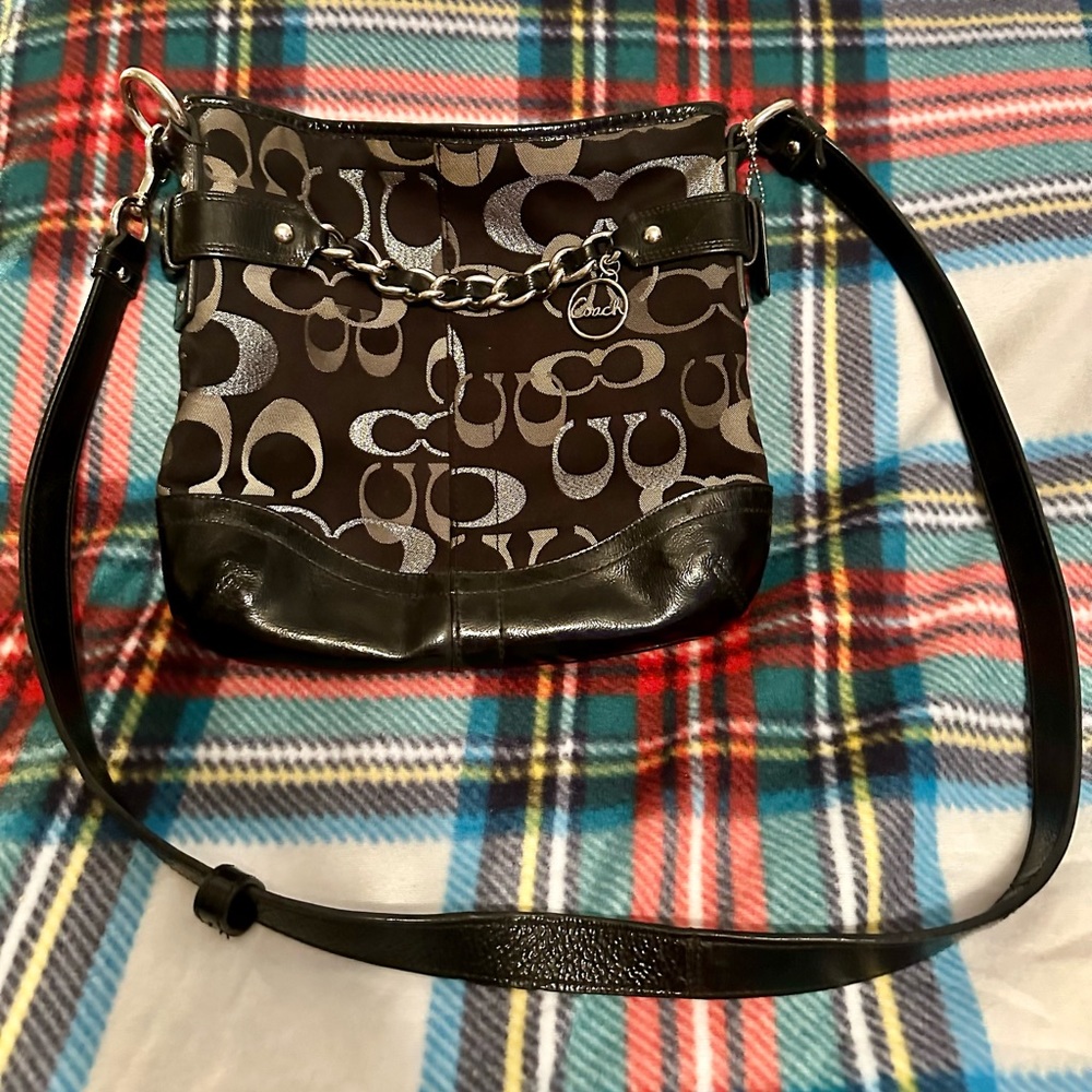Black coach cross body , perfect condition.